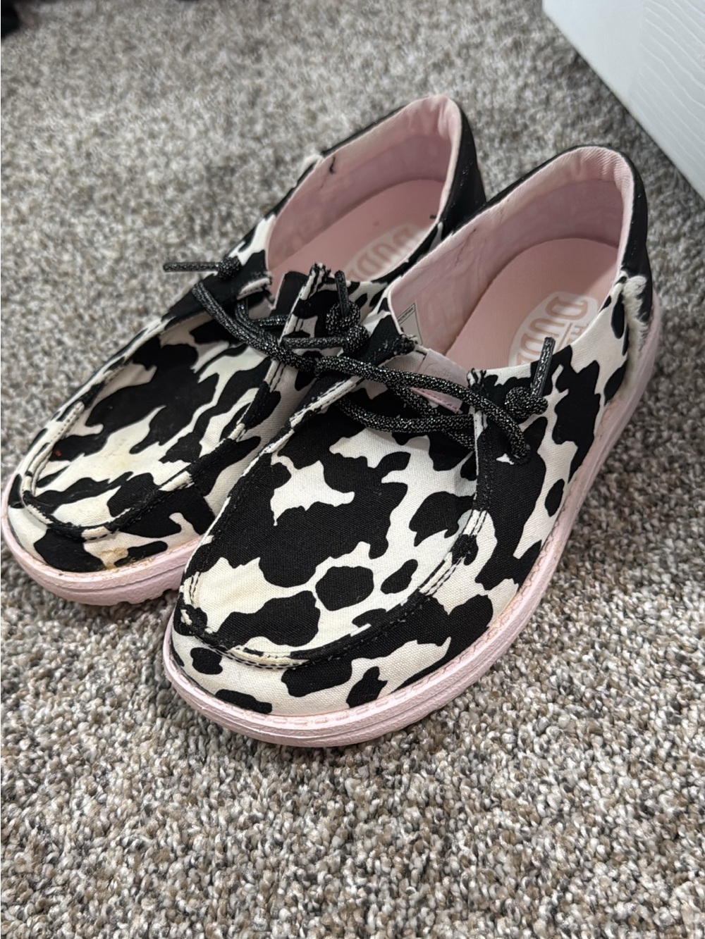 Hey Dude Kids Cow-Print Moccasins in Black, White & Pink Trim